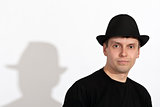 man in a black hat