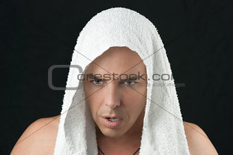 Intense Man Thinks, Workout Towel Over Head