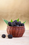 Fresh blackberries in small basket