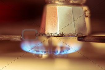 Close-up shot of Italian coffee maker on stove 