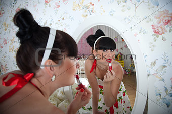 Woman near the mirror