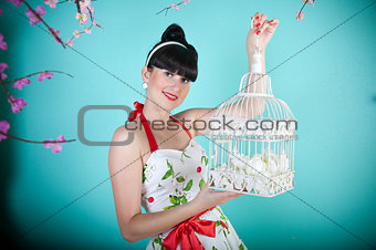 Woman with a birdcage