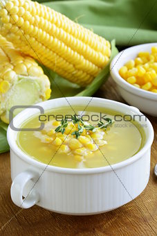 soup of fresh yellow corn served on a wooden table