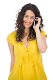 Smiling casual young woman on the phone
