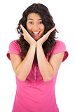 Surprised brown haired woman posing