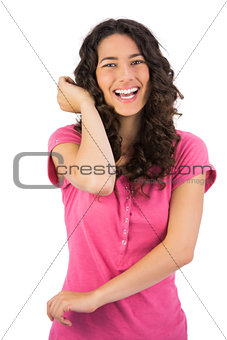 Smiling brown haired woman gesturing