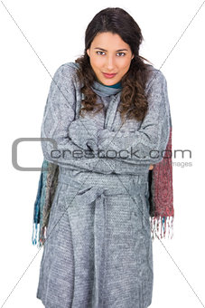 Gorgeous model with winter clothes being cold
