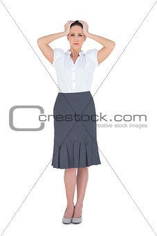 Anxious elegant businesswoman posing