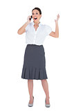 Cheerful businesswoman having a phone call
