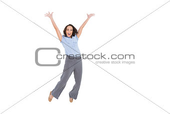 Cheerful classy businesswoman jumping