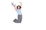 Happy classy businesswoman jumping while holding clipboard