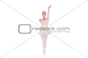Smiling ballerina with her arms extended