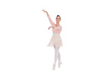 Smiling gorgeous ballerina with her arms up