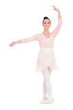 Happy gorgeous ballerina standing in a pose