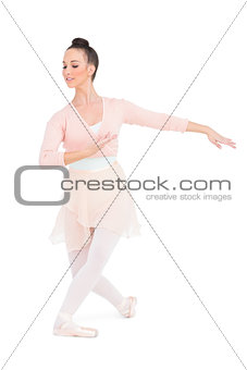 Peaceful attractive ballerina posing