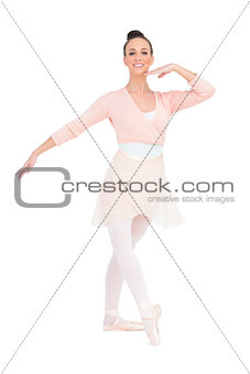 Happy attractive ballerina posing