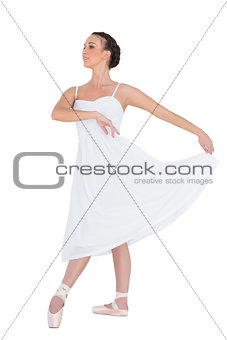 Focused young ballet dancer posing