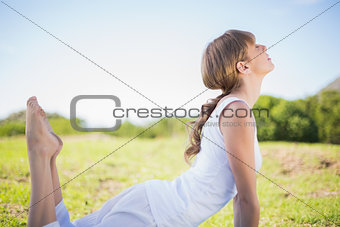 Natural young woman stretching