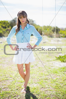 Trendy young model posing outside