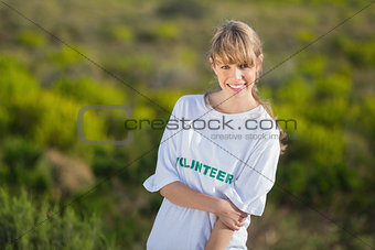 Natural young blonde wearing a volunteering t shirt