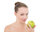 Natural pretty blonde model holding an apple