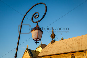 Street Lamp and Medieval Church in Megeve, French Alps