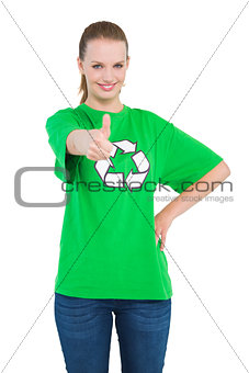 Joyful pretty environmental activist giving a thumb up