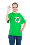 Happy pretty environmental activist making an okay gesture