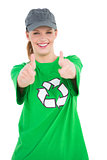 Happy pretty environmental activist making thumbs up
