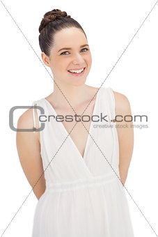 Natural model in white dress posing