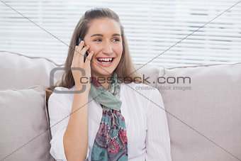 Smiling pretty model having a phone call