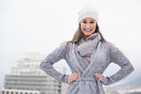 Pretty brunette with winter clothes on posing