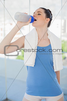 Pretty slender woman hydrating