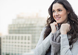 Smiling pretty woman in winter clothes posing