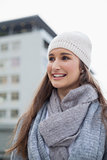 Smiling gorgeous woman with winter clothes on posing