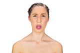 Healthy woman sticking her tongue out