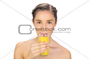 Gorgeous model drinking orange juice