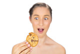 Greedy model holding cookie