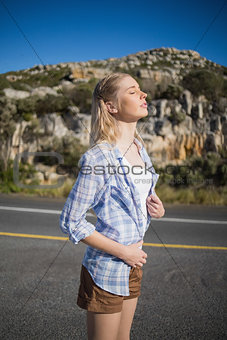 Stylish woman enjoying the sunshine