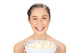 Cheerful natural model holding popcorn