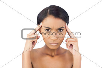 Pretty woman having a headache