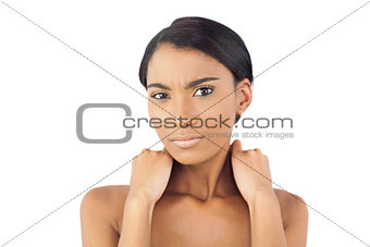 Pretty woman suffering from painful neck