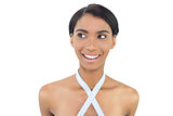 Smiling natural model with measuring tape around her neck