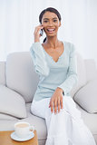 Cheerful attractive woman on the phone