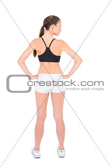 Rear view of fit woman in sportswear