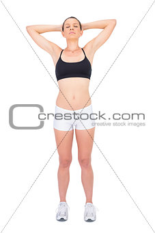 Fit woman in sportswear relaxing