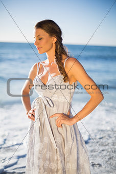 Attractive woman in summer dress posing