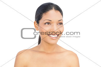 Happy black haired woman posing