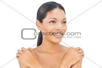 Cheerful black haired woman posing