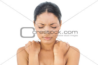 Gorgeous black haired model suffering from painful back
